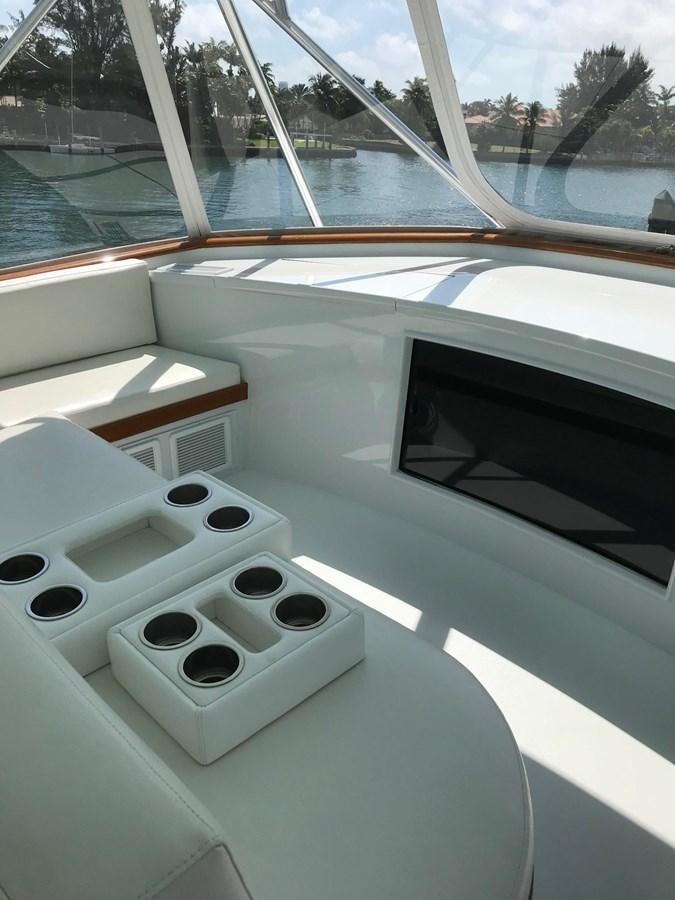 a white rectangular object with a black circle on it aboard IN FLIGHT Yacht for Sale