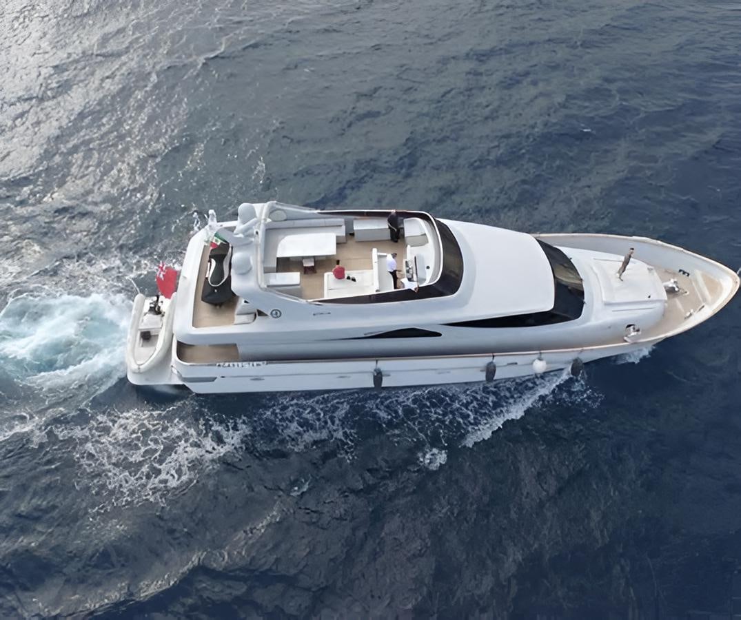 a white boat on water aboard CAMILLA A Yacht for Sale