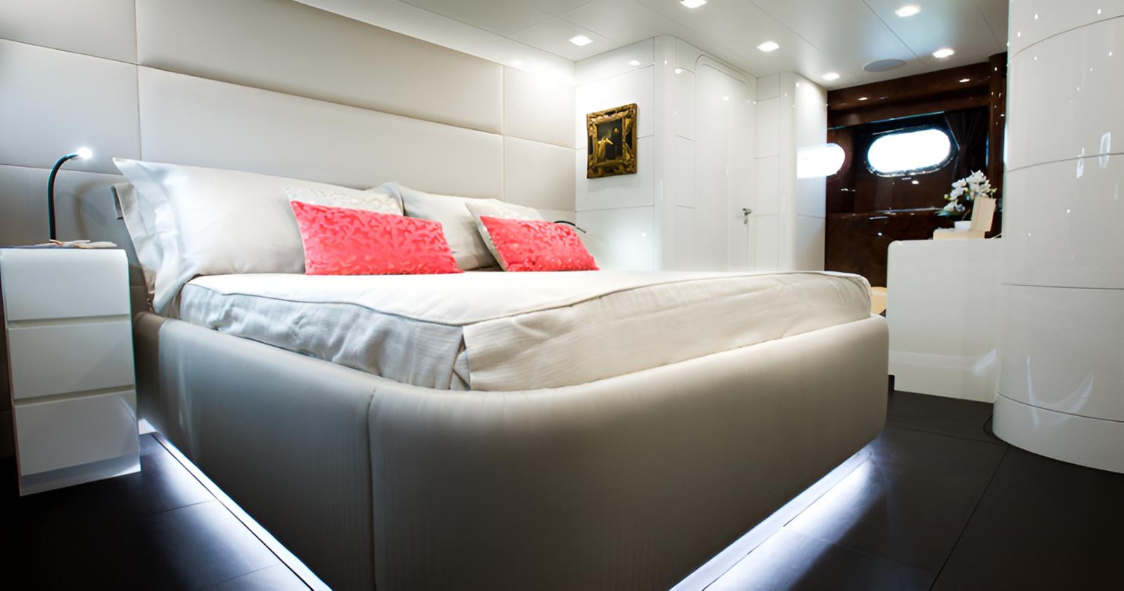 a large bed in a room aboard CAMILLA A Yacht for Sale