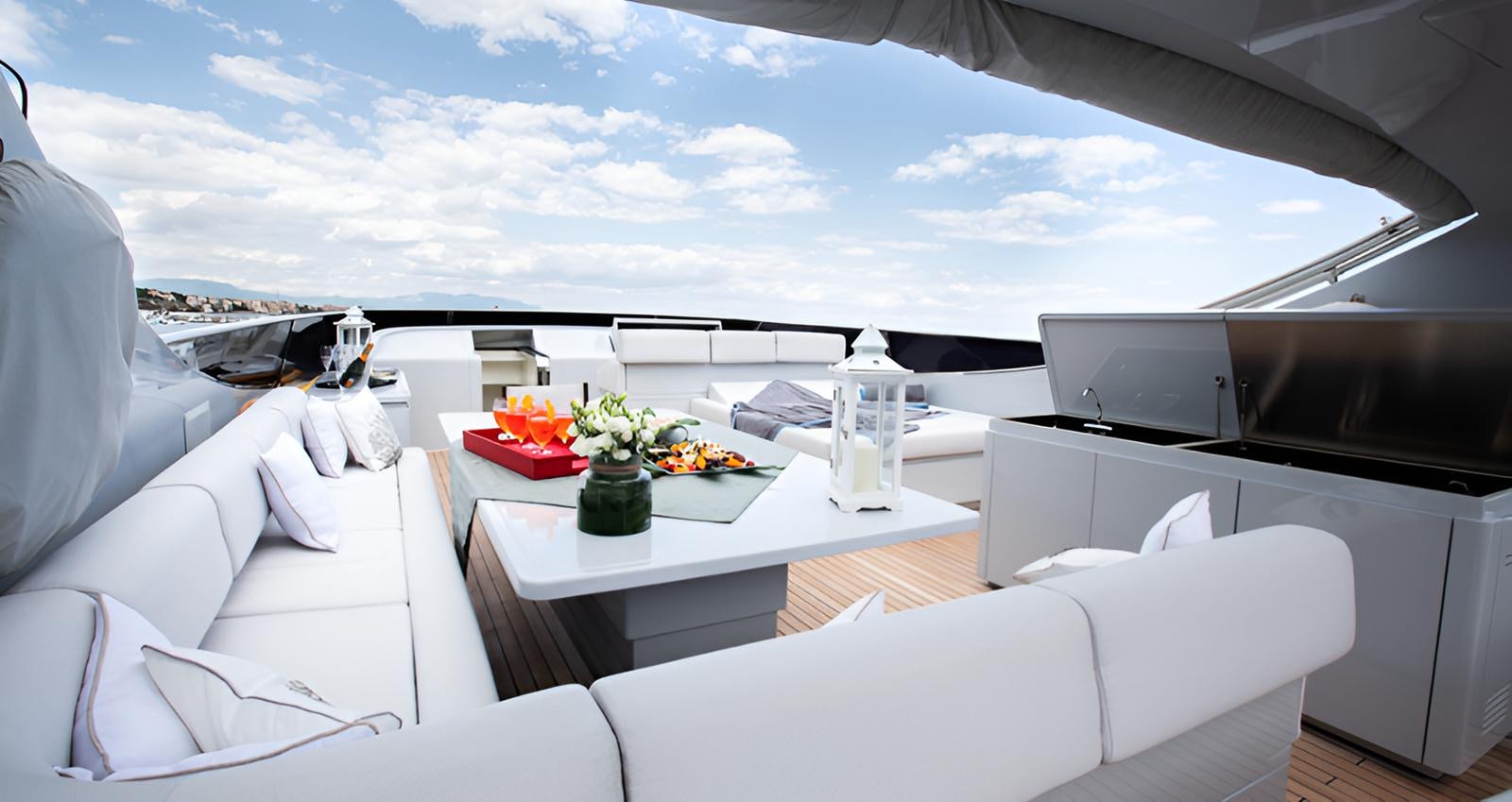 a room with a table and chairs aboard CAMILLA A Yacht for Sale