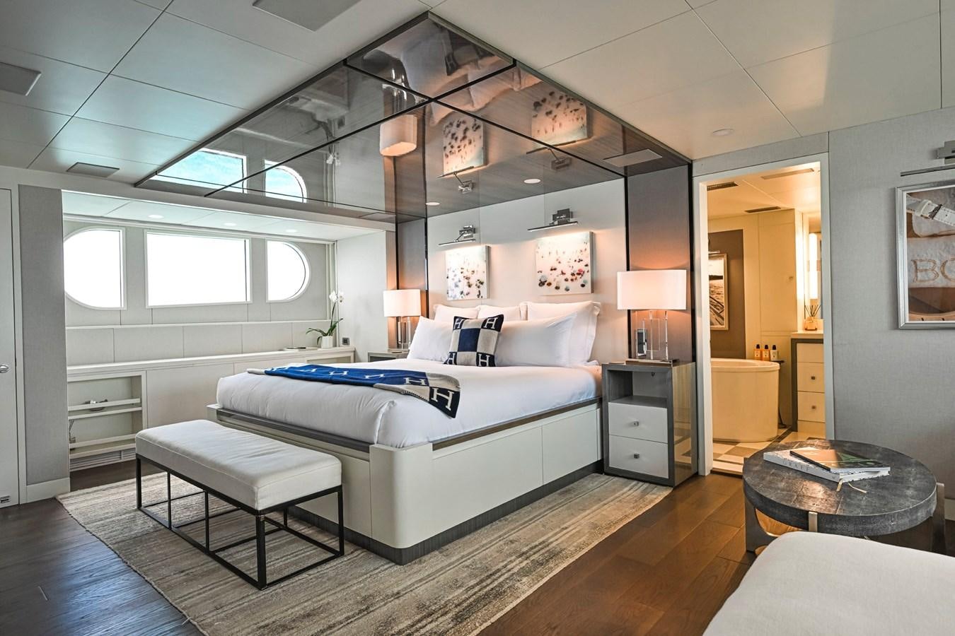 a bedroom with a large bed aboard BG CHARADE Yacht for Sale