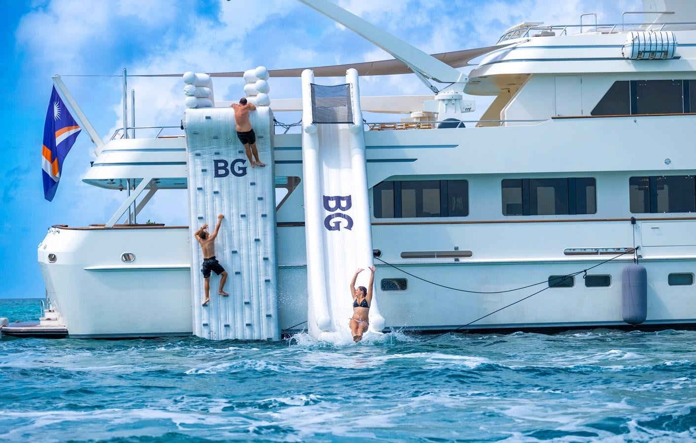 a couple of people on a boat aboard BG CHARADE Yacht for Sale