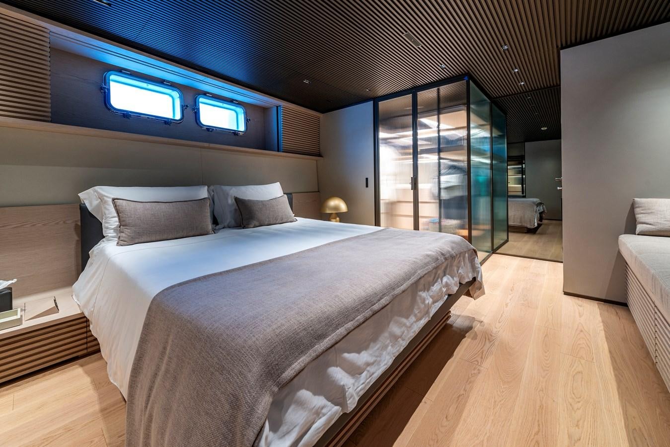 a bed in a room aboard HH Yacht for Sale