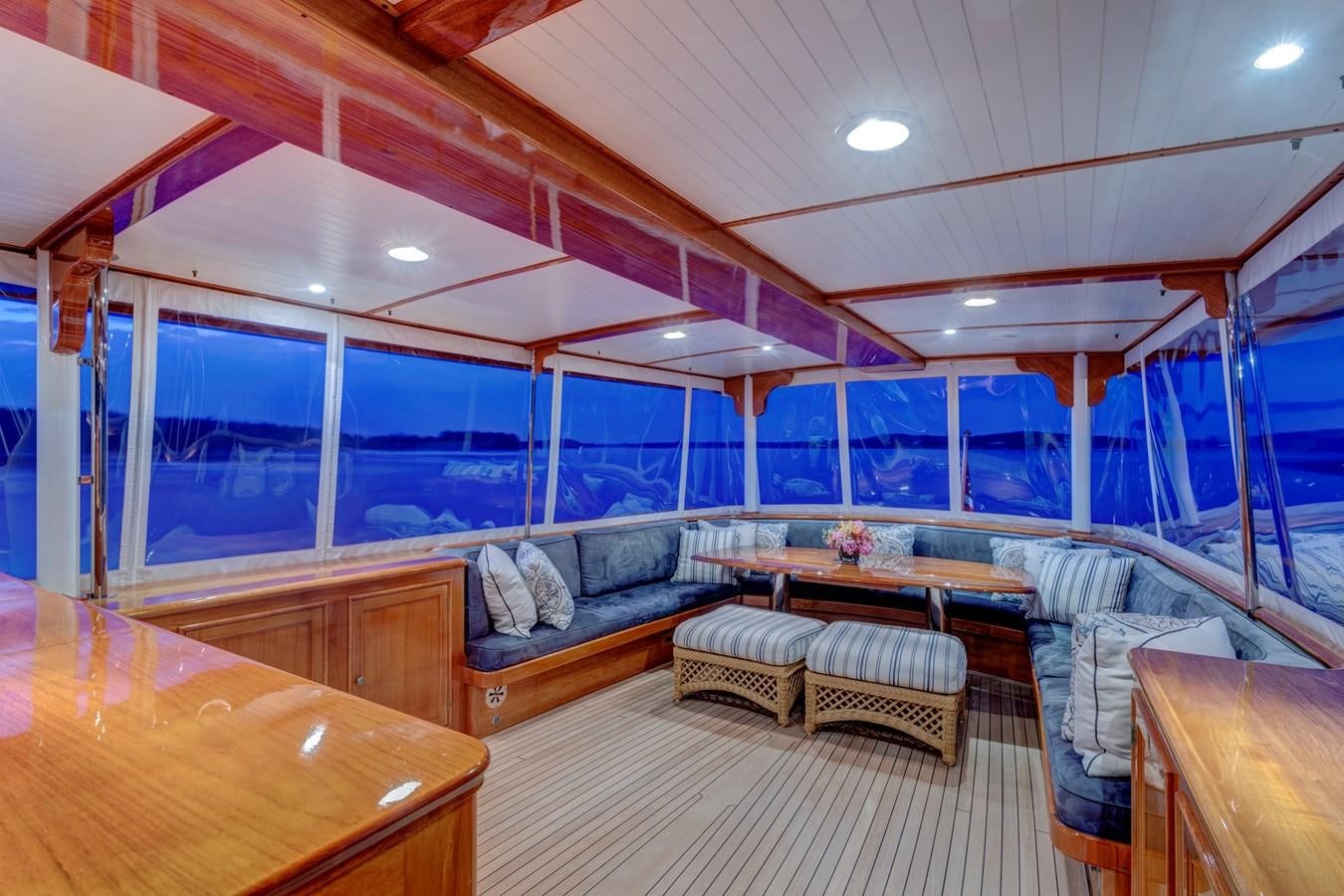 a room with a table and chairs aboard ANNABELLE Yacht for Sale