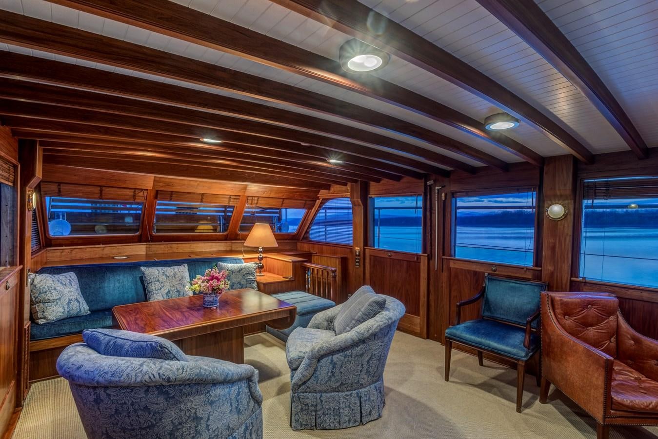 a living room with a couch and a table aboard ANNABELLE Yacht for Sale