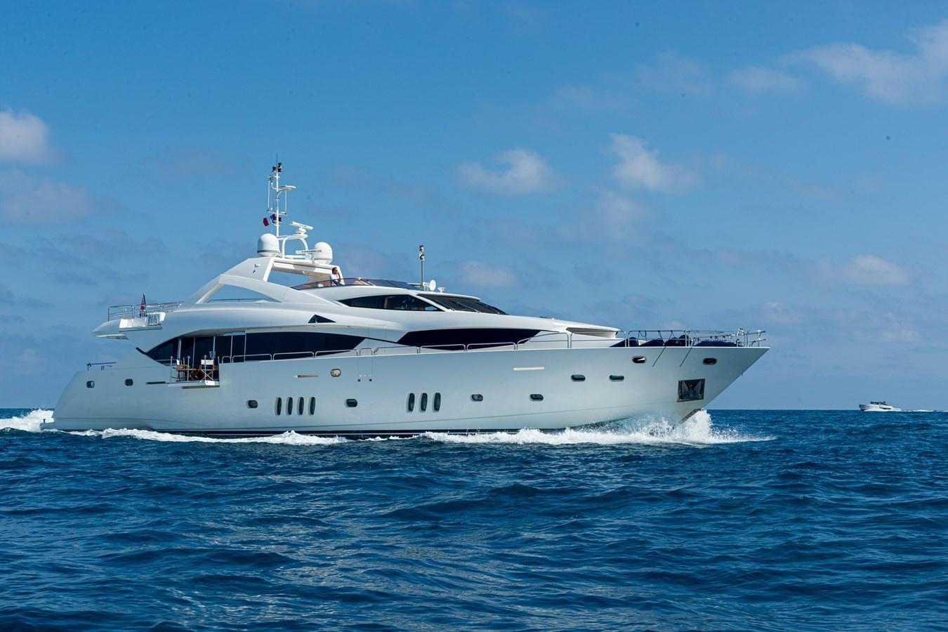a white yacht on the water aboard KING OF OIL Yacht for Sale