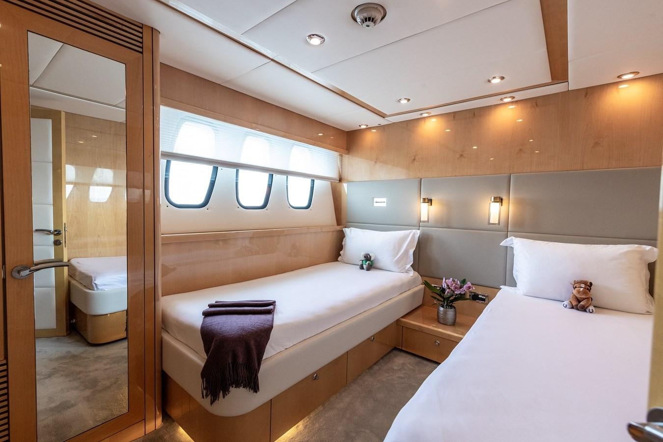 a modern bathroom with a double bed aboard KING OF OIL Yacht for Sale