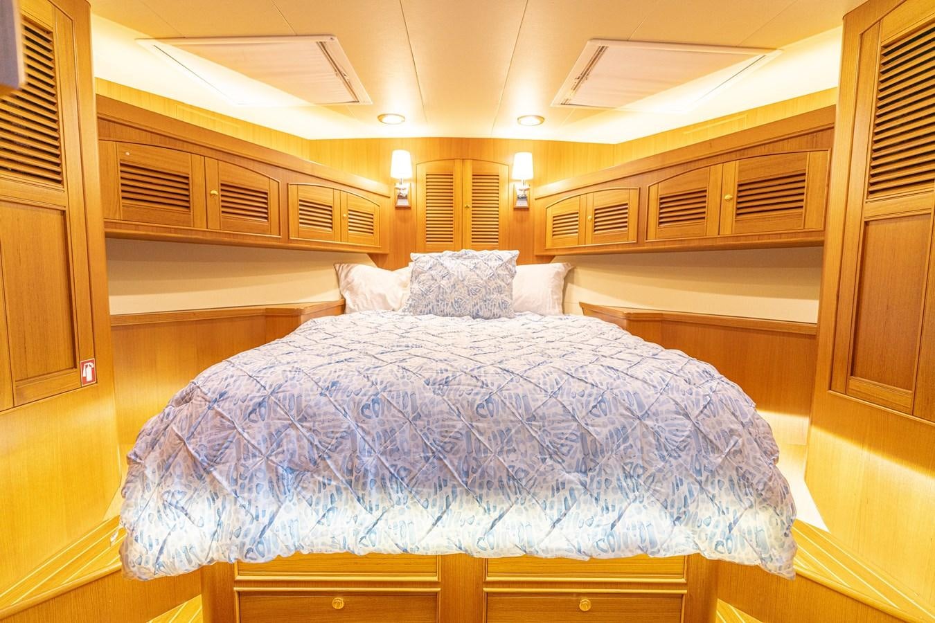a bed in a room aboard UNDERDOG Yacht for Sale