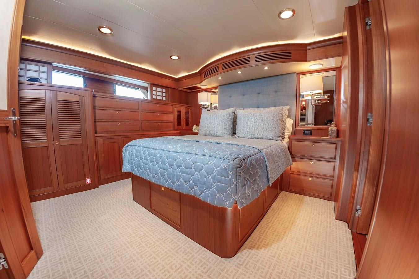 a bedroom with a bed aboard UNDERDOG Yacht for Sale