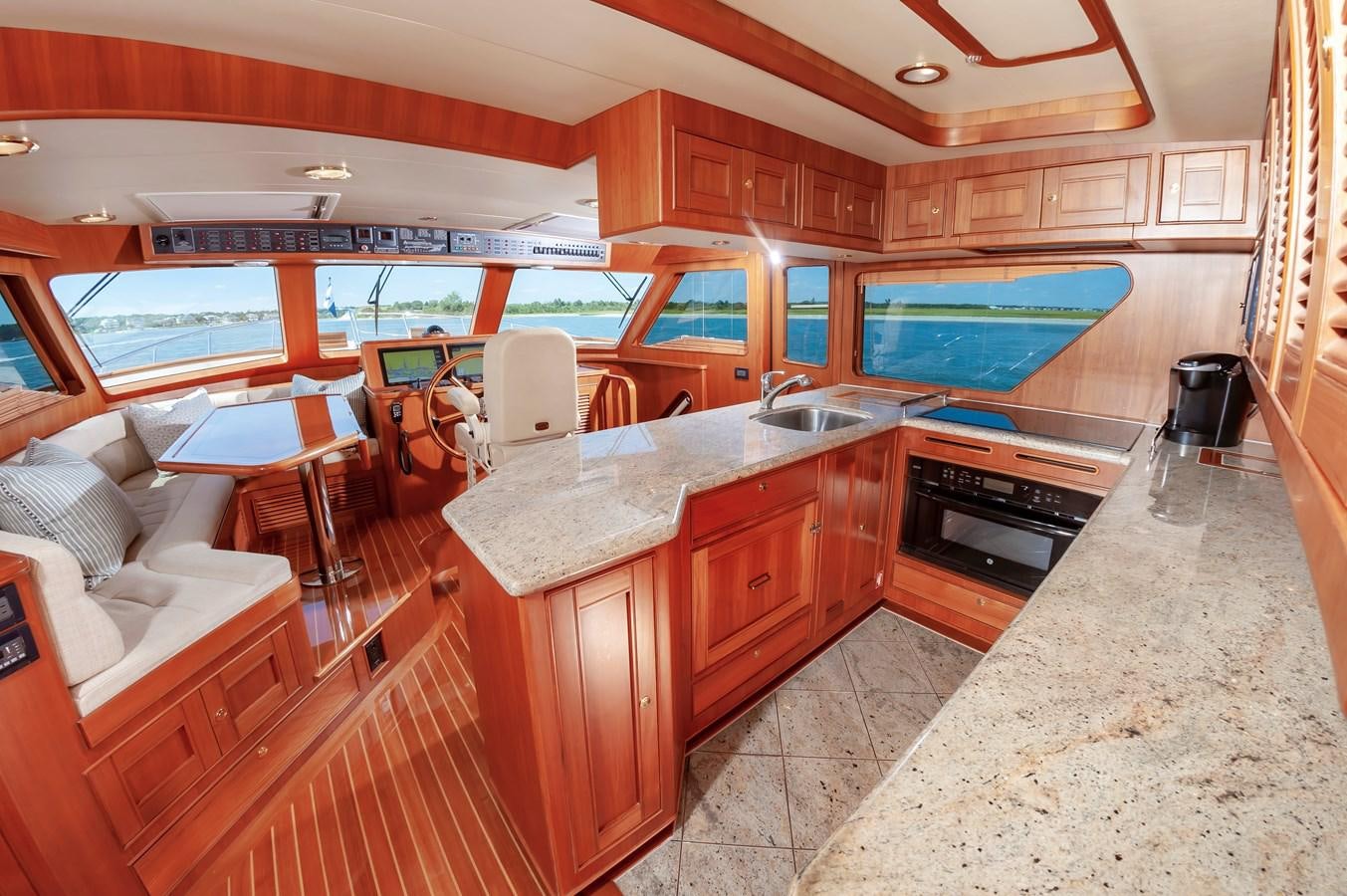 a kitchen with a large island aboard UNDERDOG Yacht for Sale