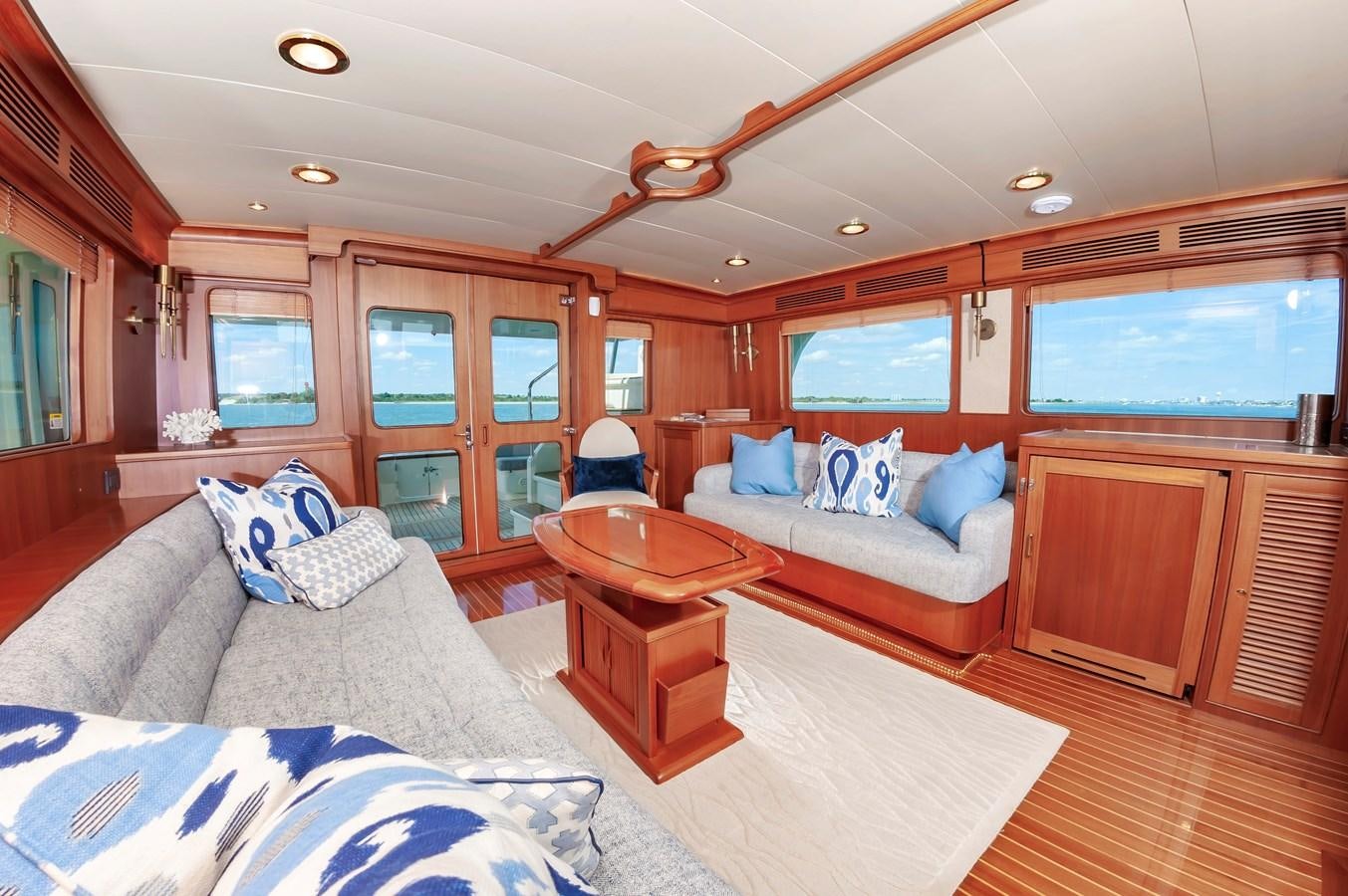 a large cabin with a bed and a couch aboard UNDERDOG Yacht for Sale
