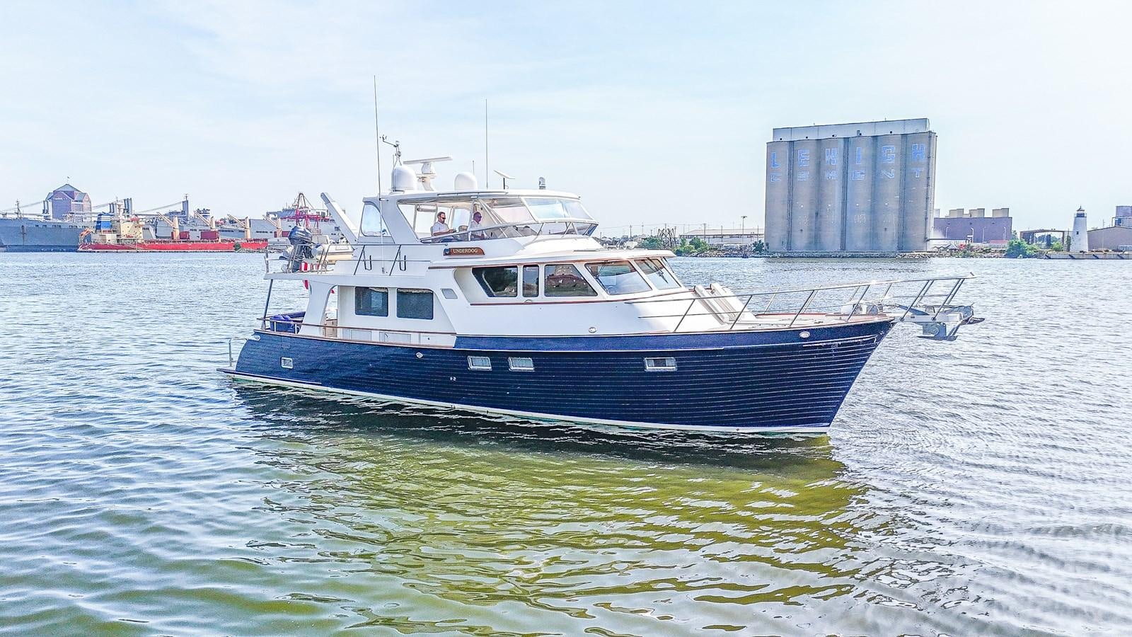 a boat in the water aboard UNDERDOG Yacht for Sale