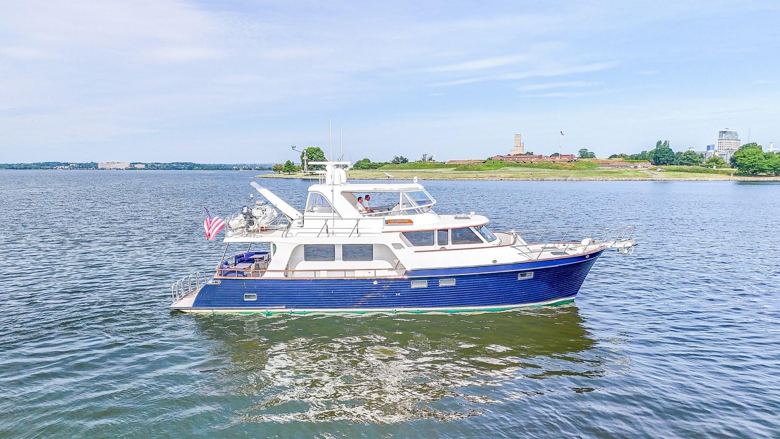 a boat on the water aboard UNDERDOG Yacht for Sale