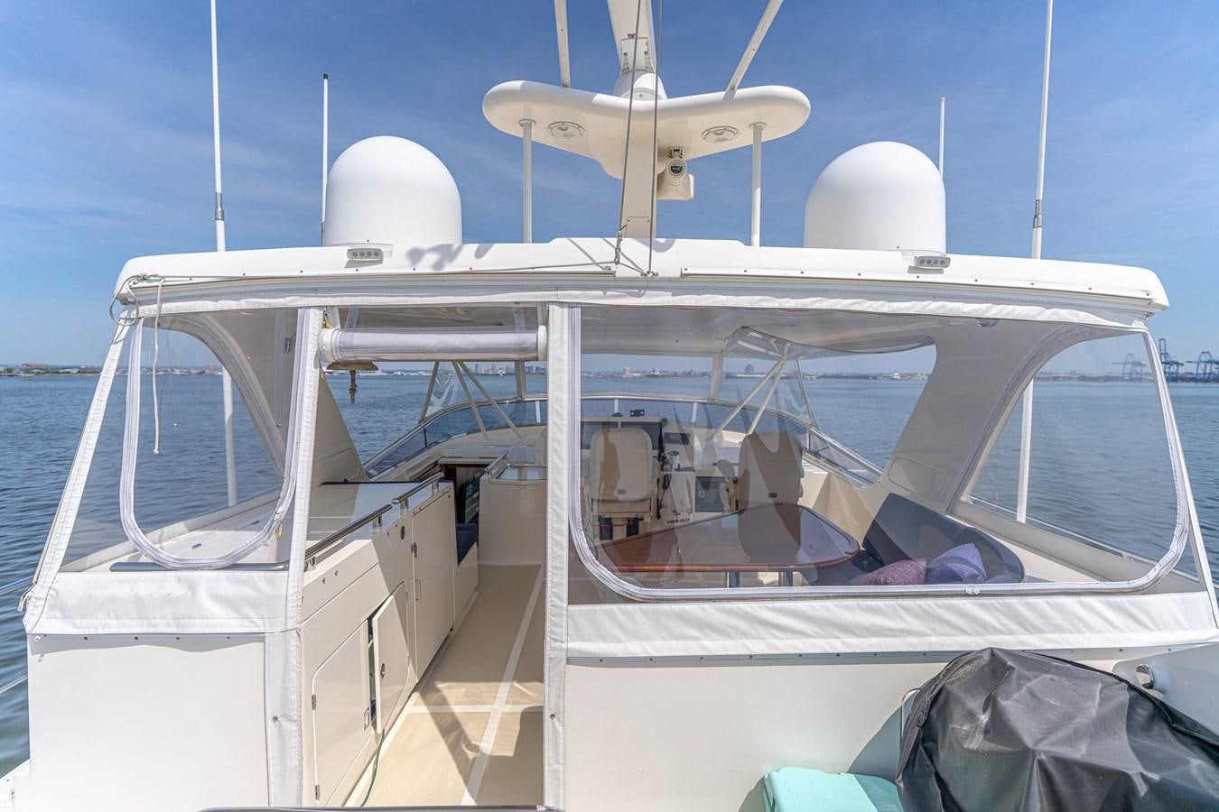 a boat with a person sitting on it aboard UNDERDOG Yacht for Sale