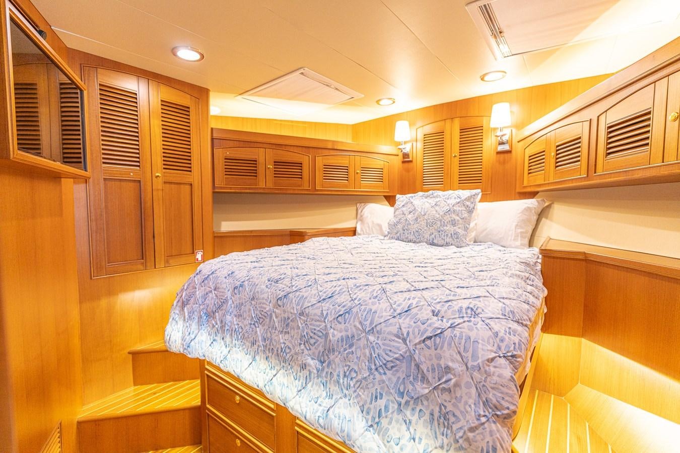 a large bedroom with a large bed aboard UNDERDOG Yacht for Sale