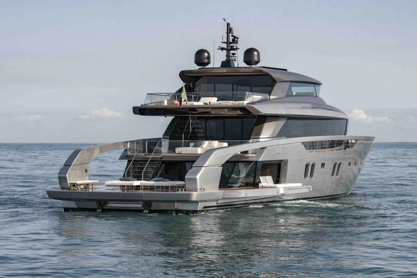 a large white boat in the water aboard HM 1 Yacht for Sale