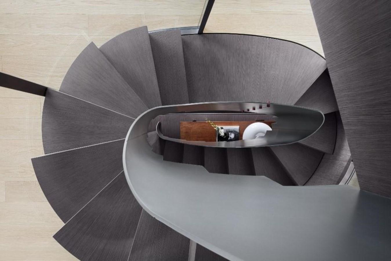 a couch with a coffee table aboard HM 1 Yacht for Sale