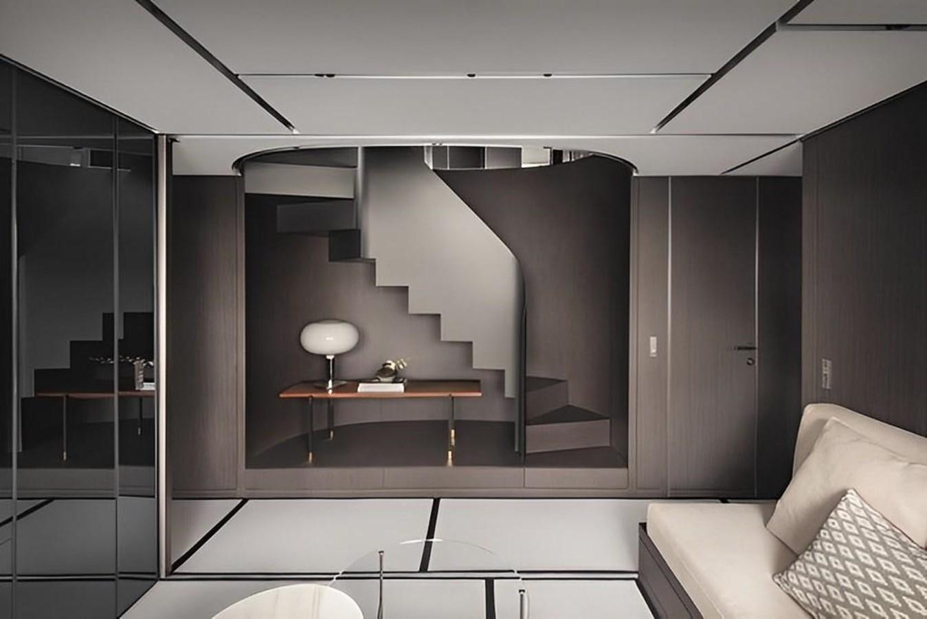 a room with a table and a lamp aboard HM 1 Yacht for Sale