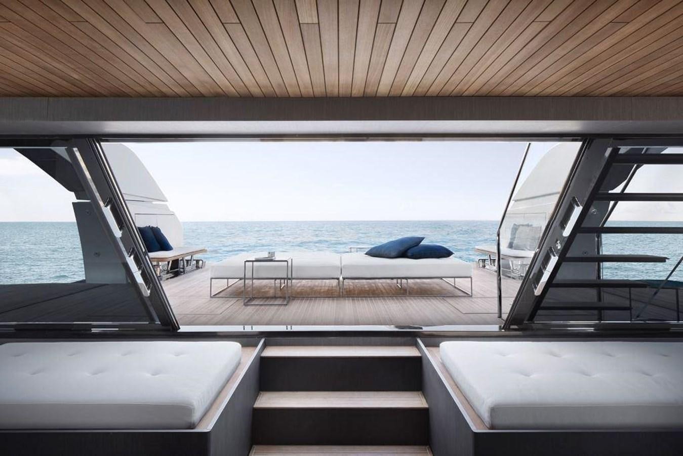 a deck with a view of the ocean and the deck aboard HM 1 Yacht for Sale