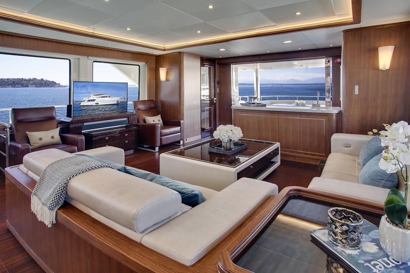 a living room with a large window aboard 2025 SELENE 92 EXPEDITION YACHT Yacht for Sale