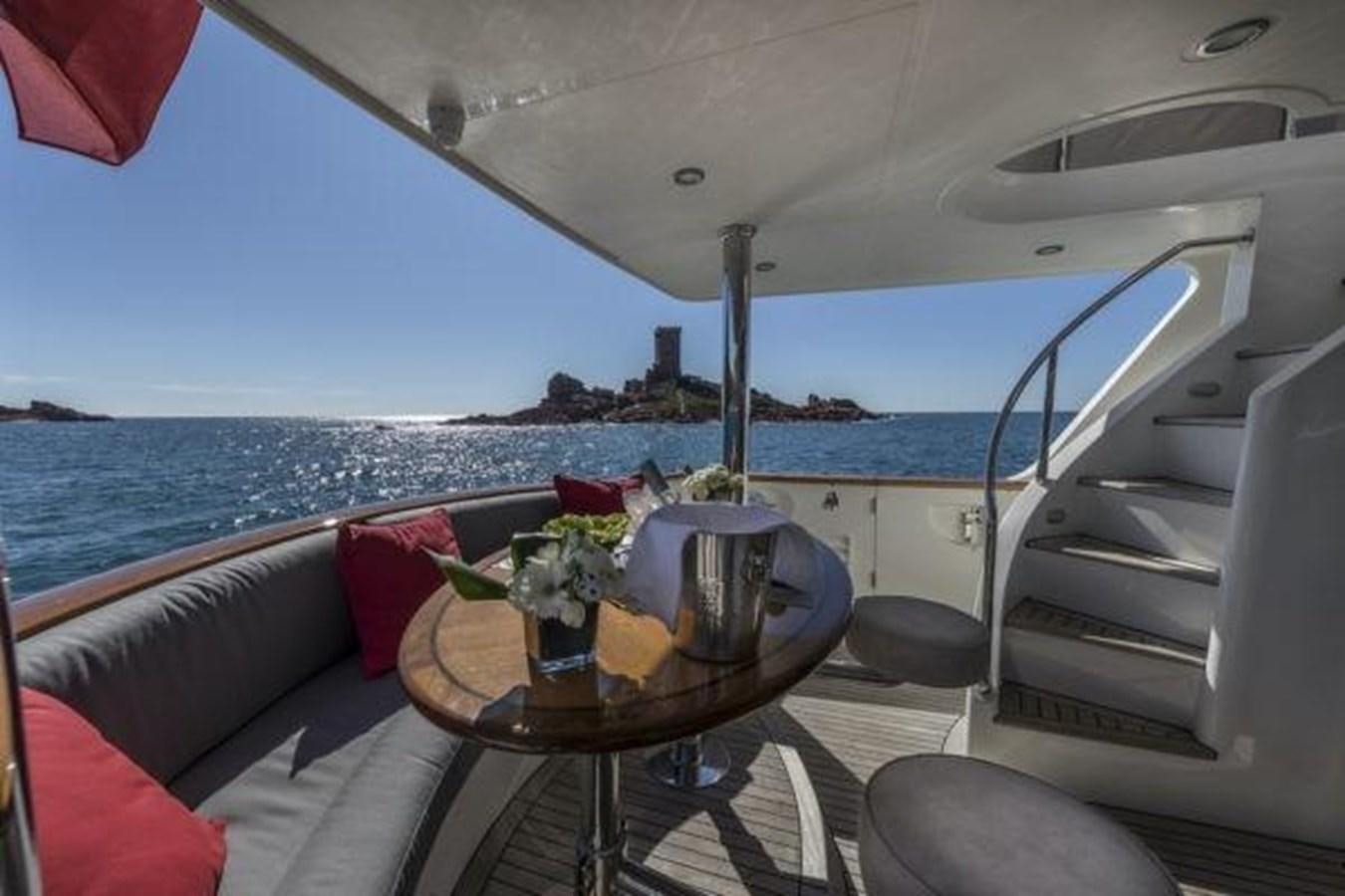 a boat with a table and chairs aboard 2024 SELENE 62 Yacht for Sale