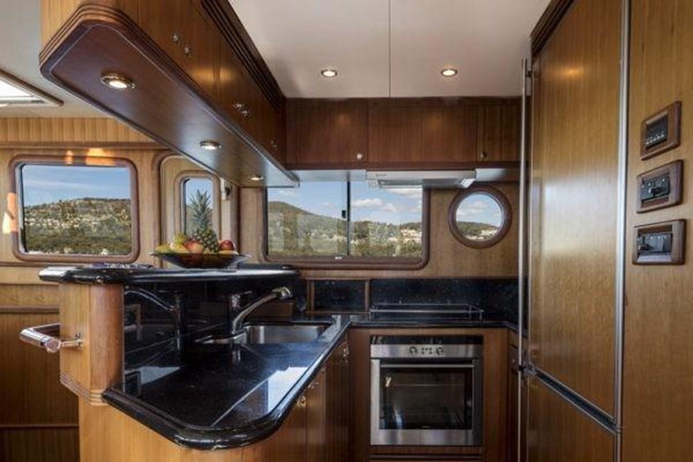 a kitchen with a large window aboard 2024 SELENE 62 Yacht for Sale