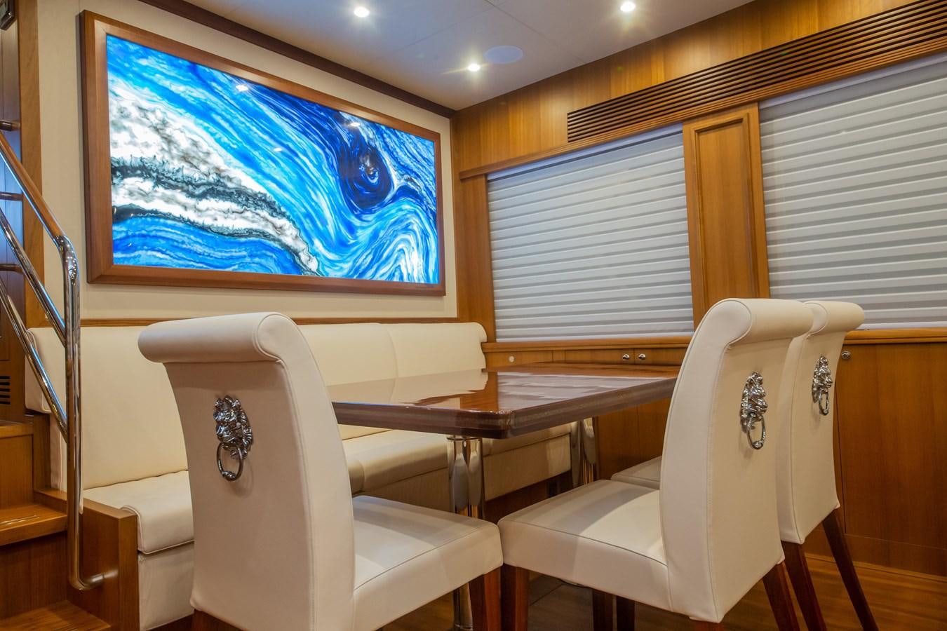 a room with a table and chairs aboard 2024 SELENE 62 Yacht for Sale
