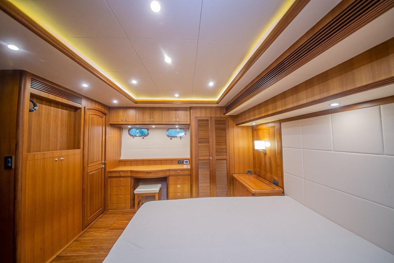 a room with a bed and a closet aboard 2024 SELENE 62 Yacht for Sale