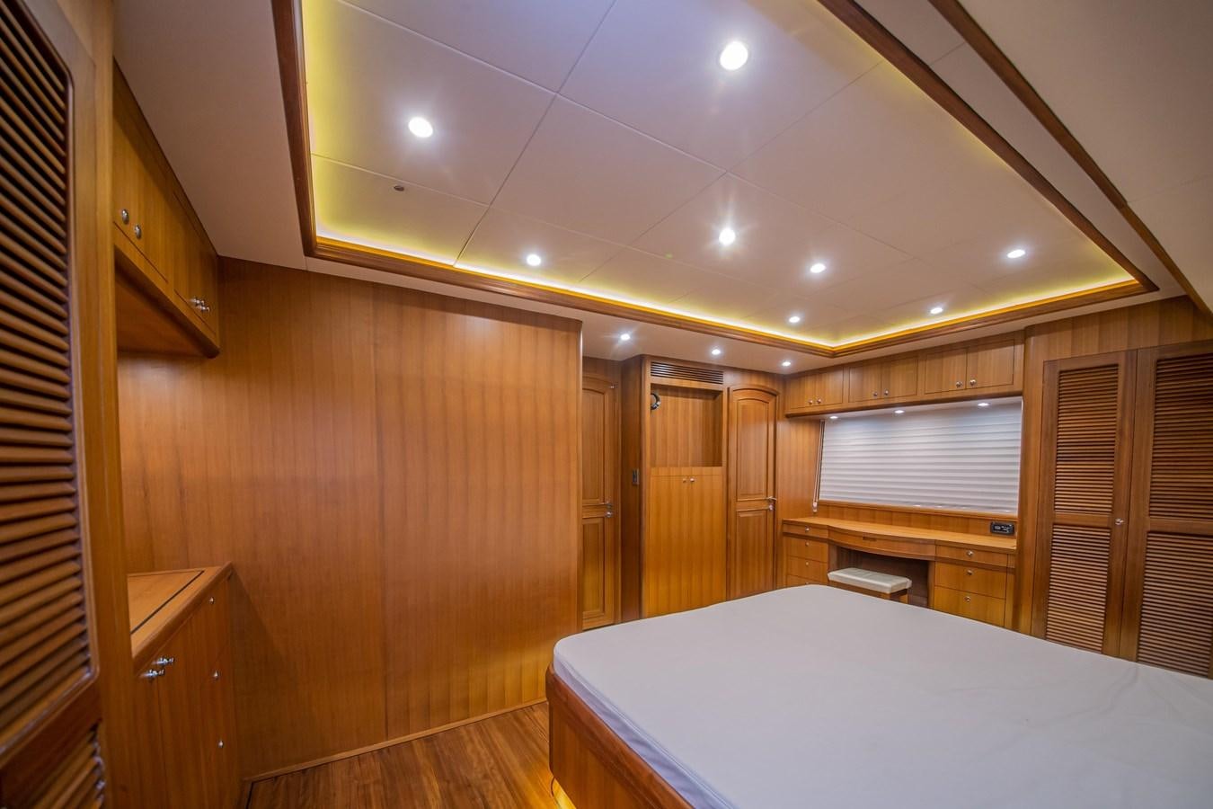 a room with a bed and a closet aboard 2024 SELENE 62 Yacht for Sale