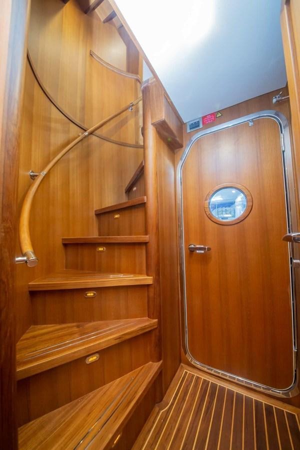 a wooden door with a mirror above it aboard 2024 SELENE 62 Yacht for Sale