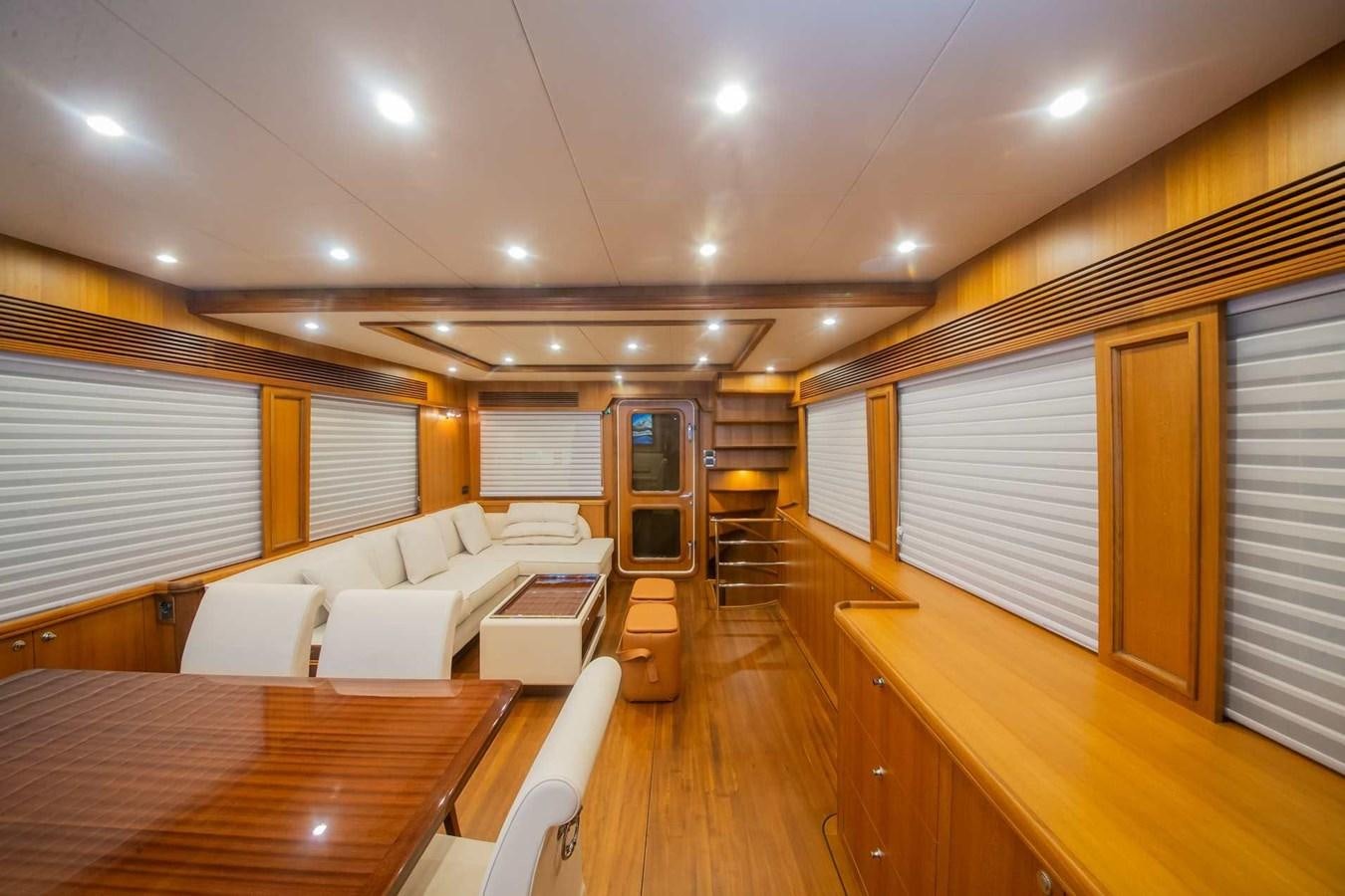 a room with a table and chairs aboard 2024 SELENE 62 Yacht for Sale