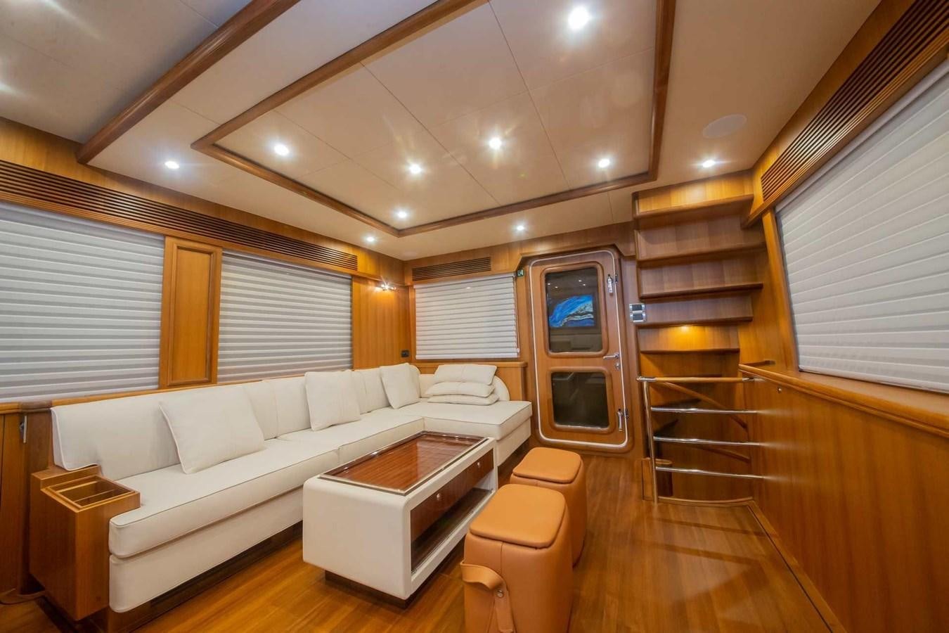 a living room with a wood floor aboard 2024 SELENE 62 Yacht for Sale