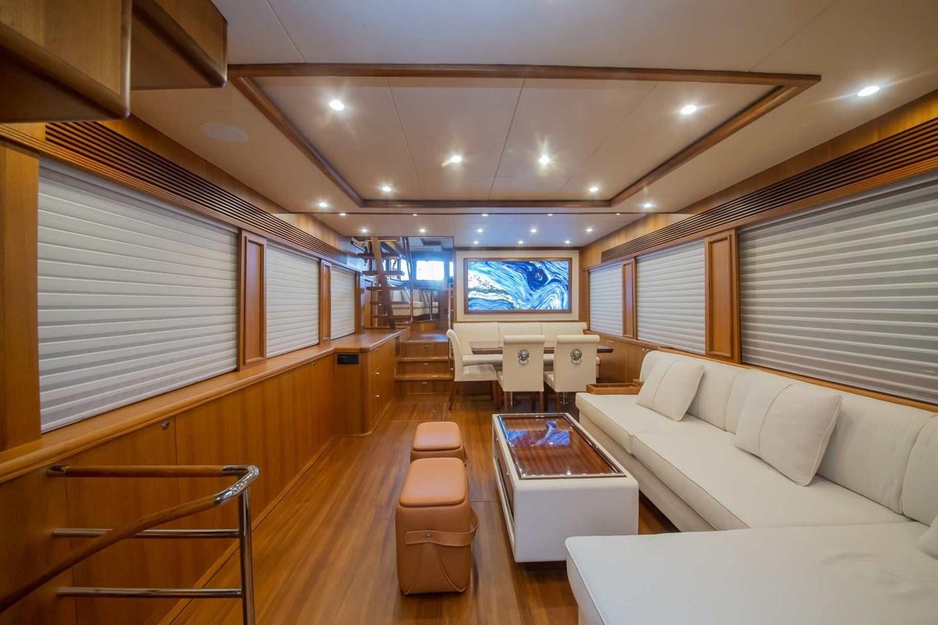 a room with a couch and a table and chairs aboard 2024 SELENE 62 Yacht for Sale
