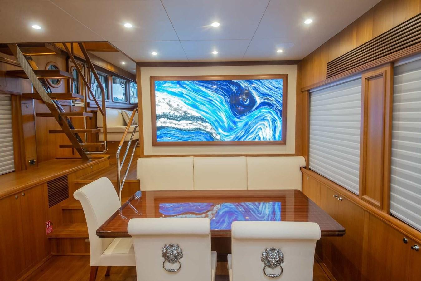 a living room with a large painting aboard 2024 SELENE 62 Yacht for Sale