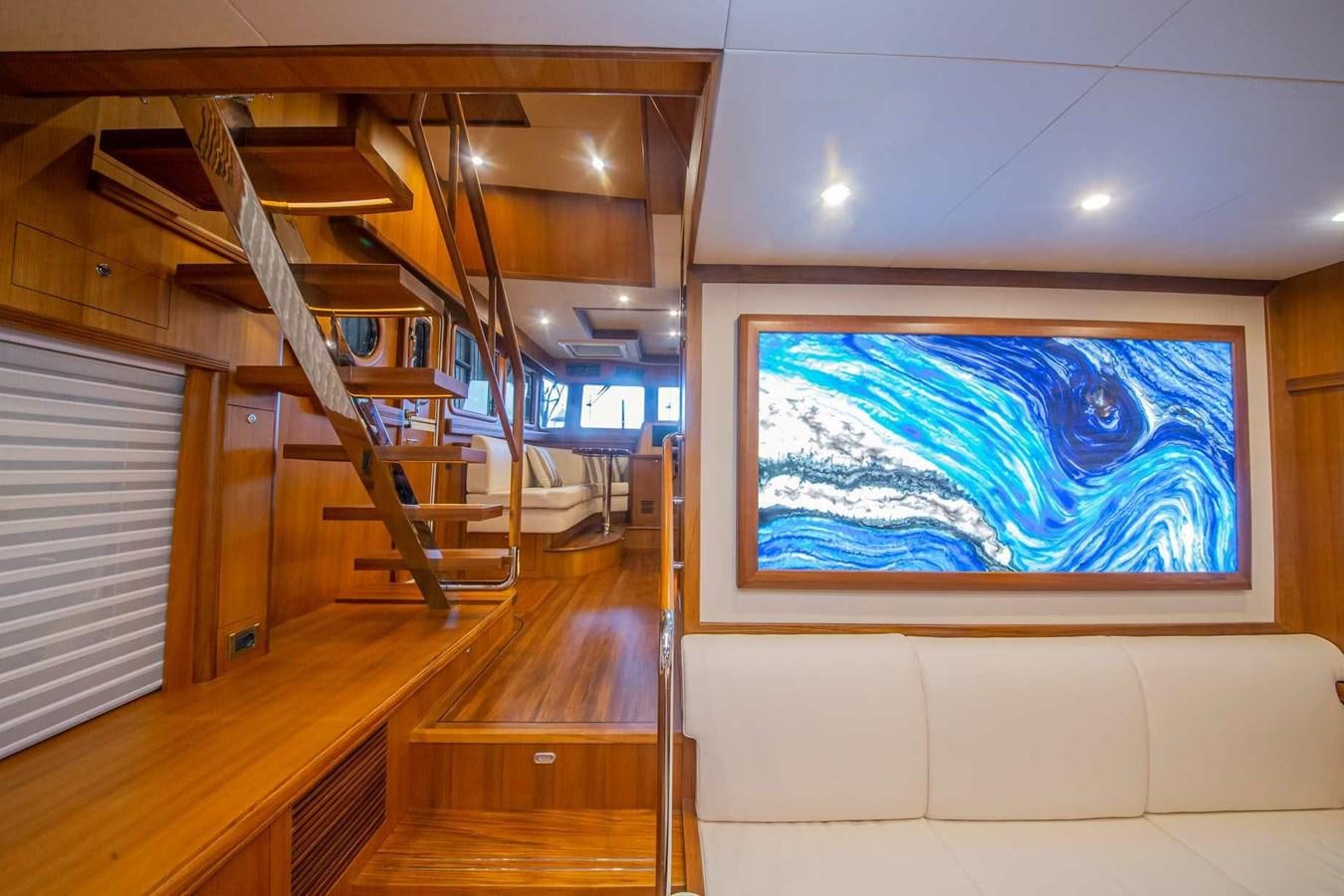 a large room with a painting on the wall aboard 2024 SELENE 62 Yacht for Sale