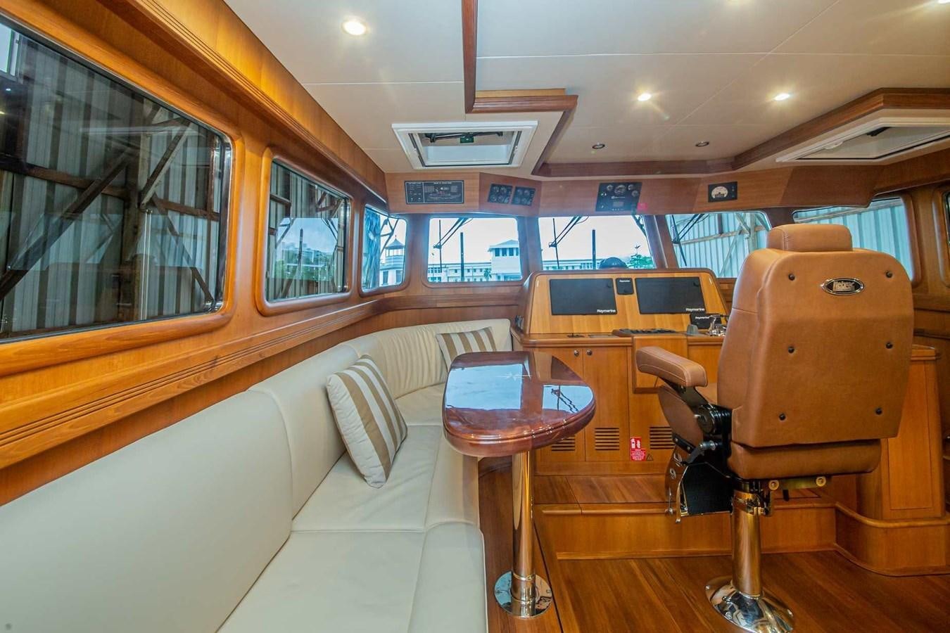 a bus with a bench and chairs aboard 2024 SELENE 62 Yacht for Sale