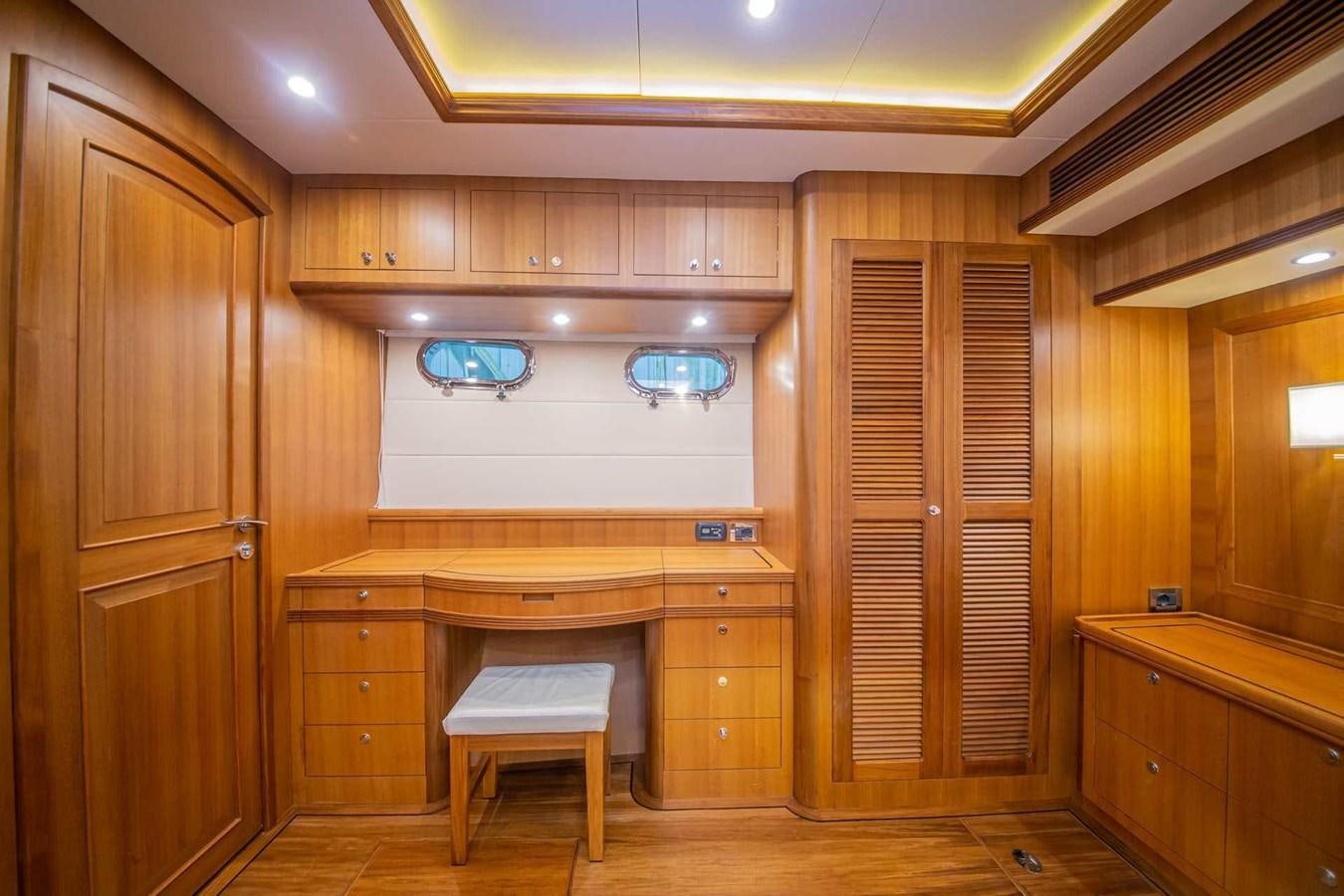 a room with wooden cabinets aboard 2024 SELENE 62 Yacht for Sale