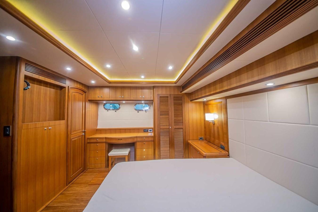 a room with a bed and a closet aboard 2024 SELENE 62 Yacht for Sale