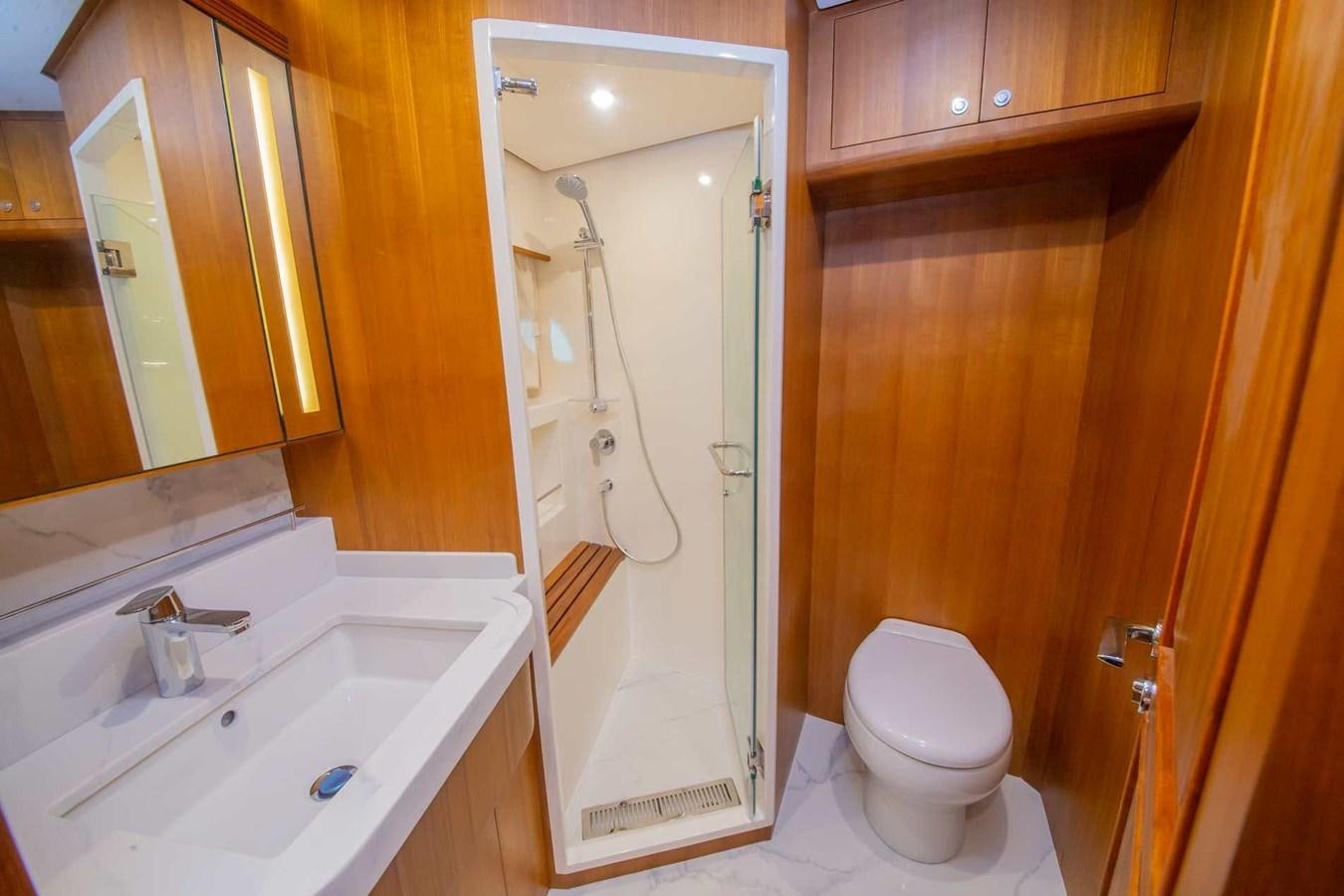 a bathroom with a shower and sink aboard 2024 SELENE 62 Yacht for Sale