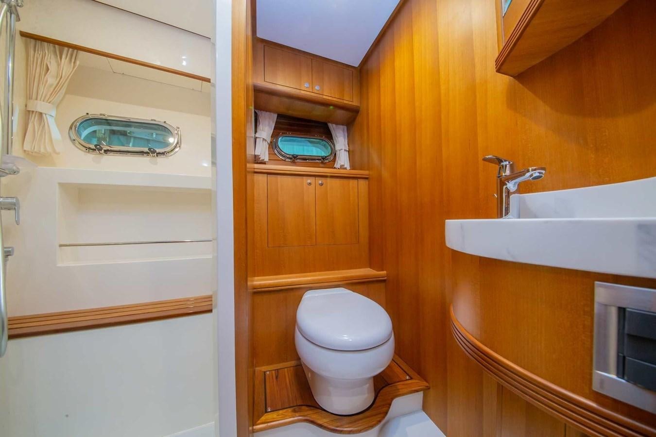 a toilet in a bathroom aboard 2024 SELENE 62 Yacht for Sale