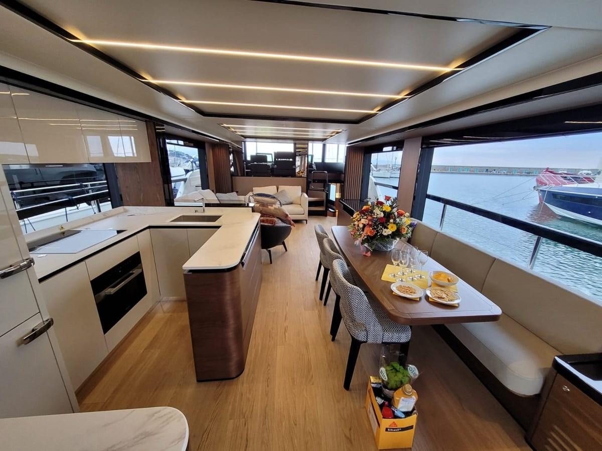 a room with a table and chairs aboard ELYSIUM Yacht for Sale
