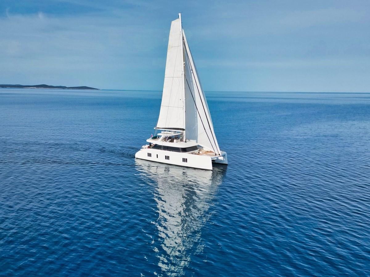 a white boat on the water aboard NALA ONE Yacht for Sale