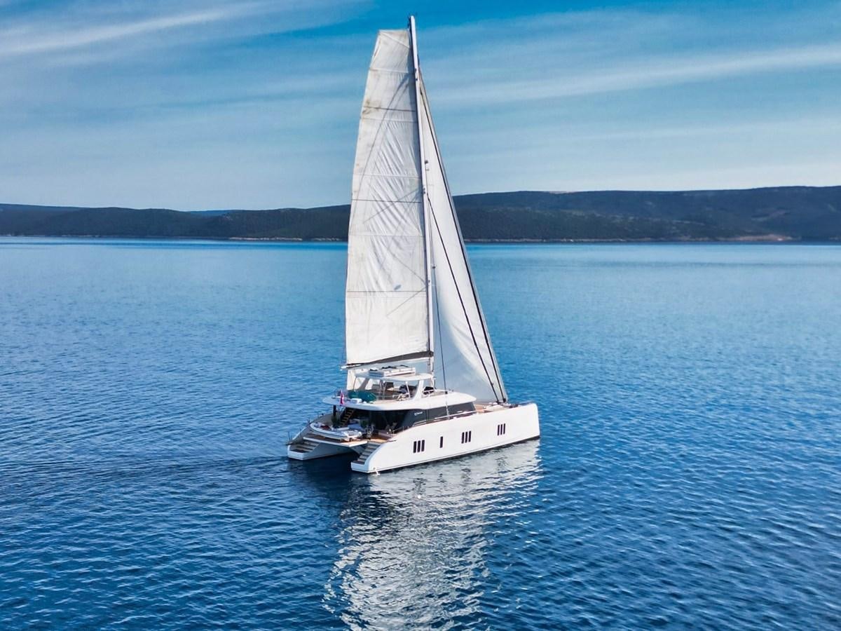 a white boat on the water aboard NALA ONE Yacht for Sale