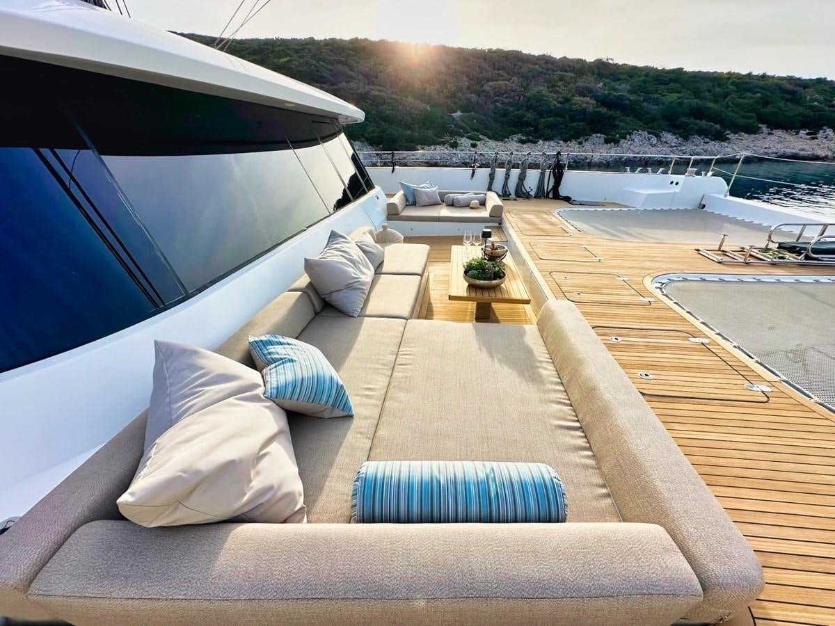 a patio with a couch and a pool aboard NALA ONE Yacht for Sale