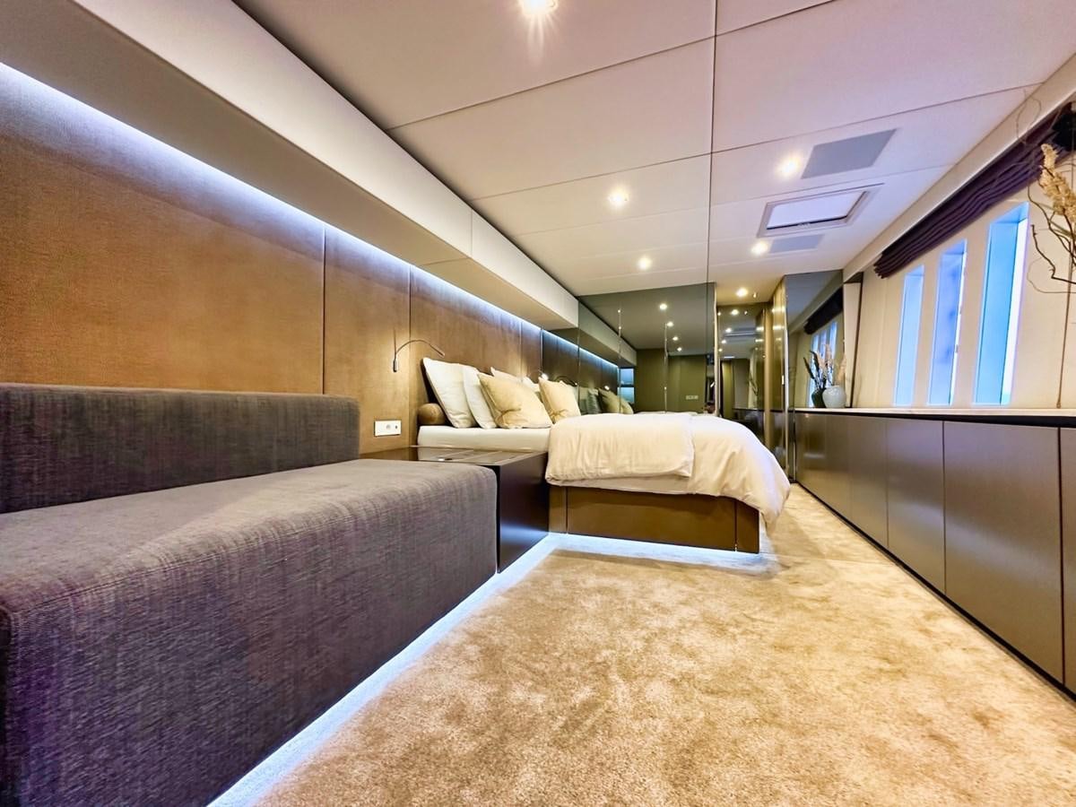 a room with couches and a table aboard NALA ONE Yacht for Sale