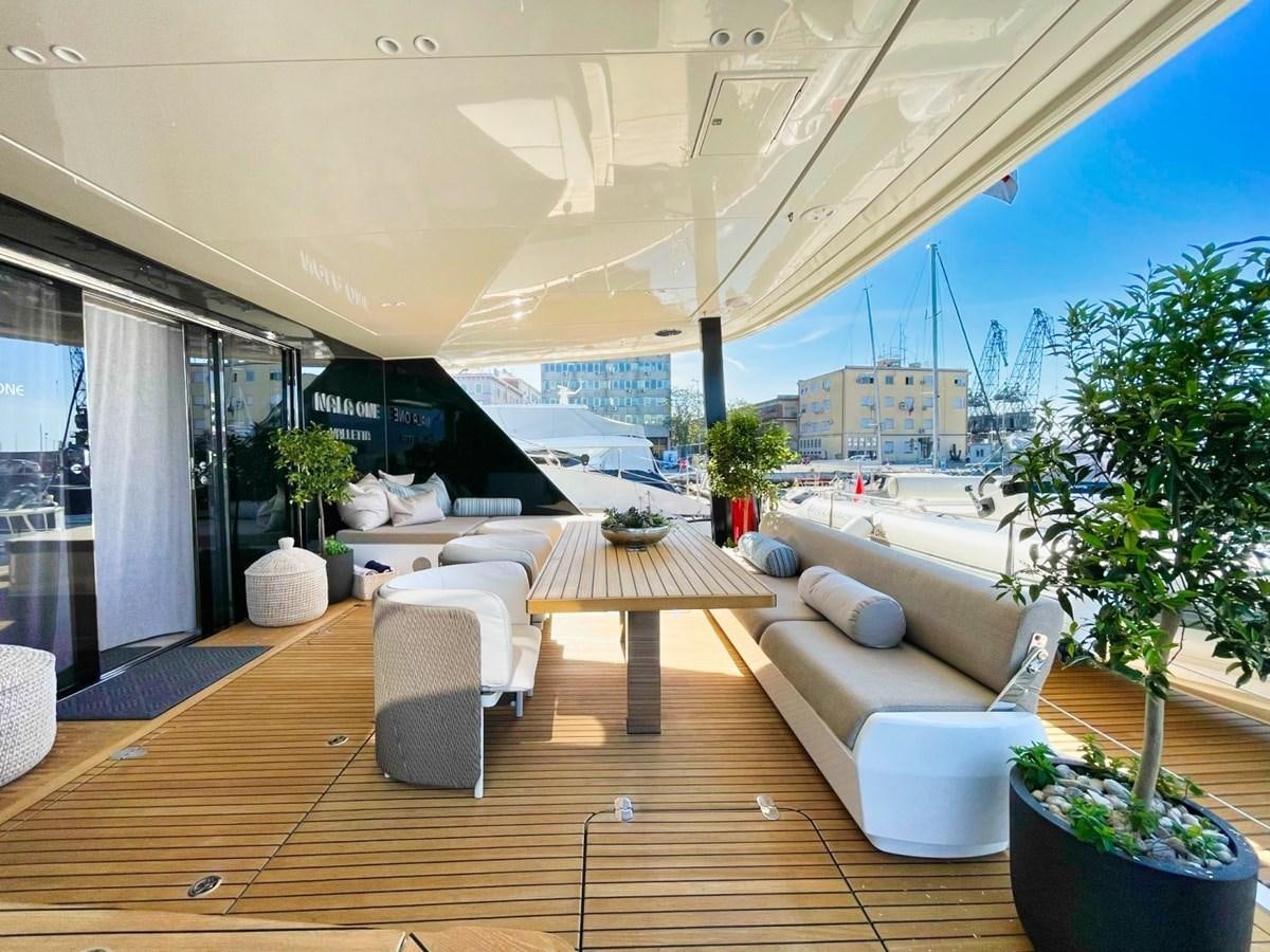 a room with a table and chairs aboard NALA ONE Yacht for Sale