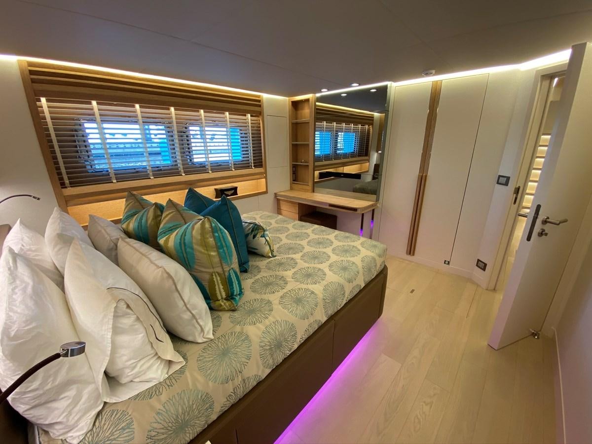 a bed in a room aboard CALLIOPE Yacht for Sale