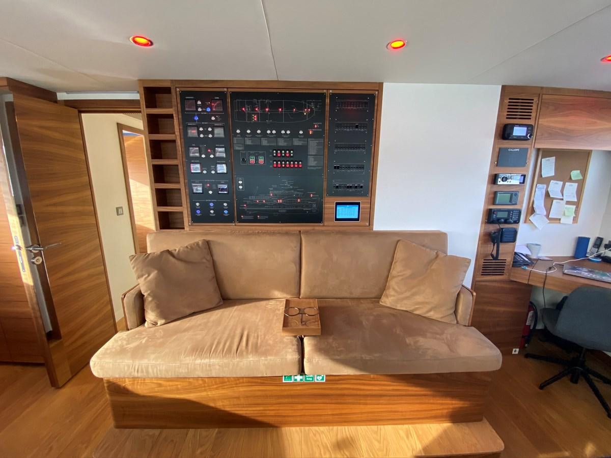 a living room with a couch aboard CALLIOPE Yacht for Sale