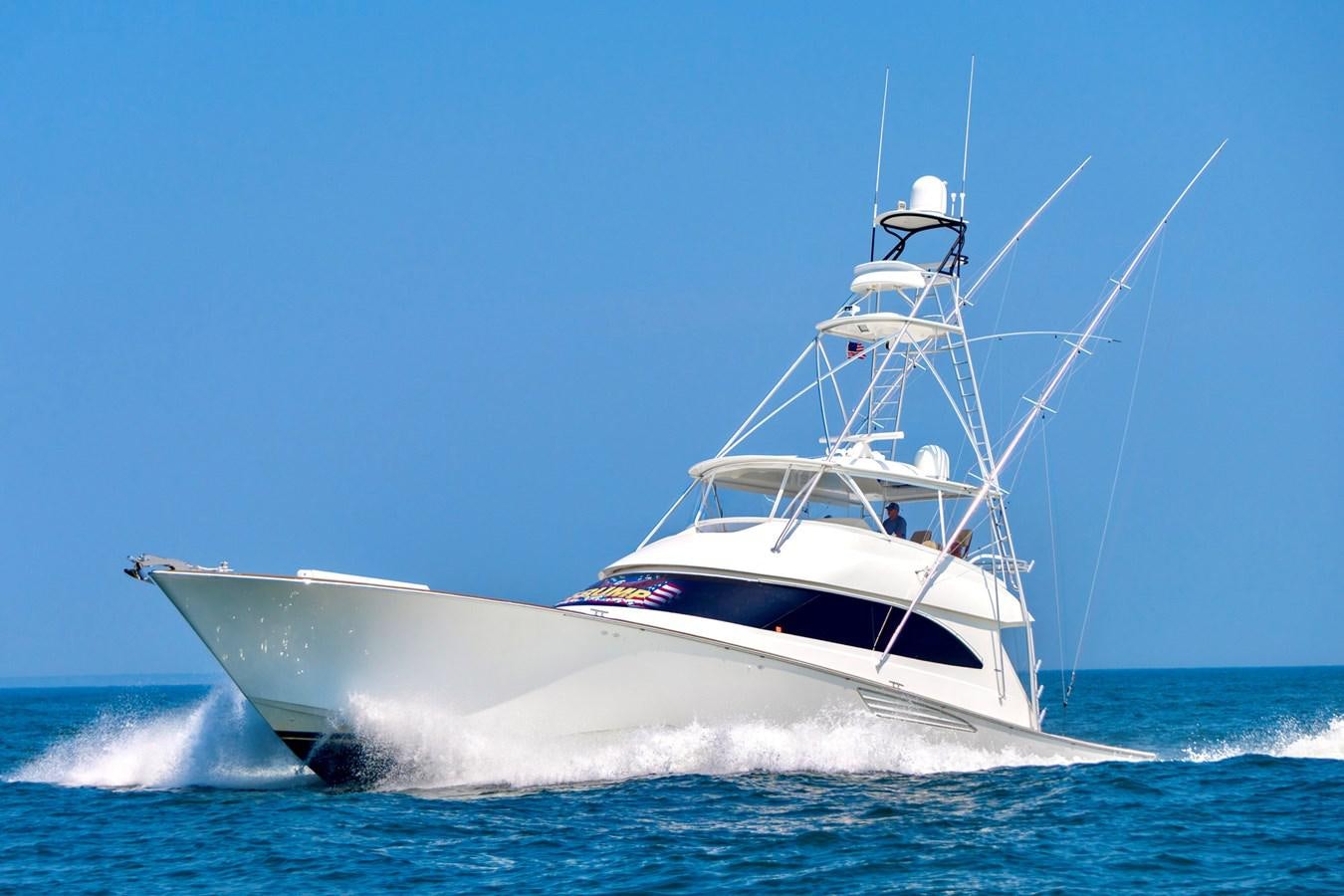 a white boat on the water aboard LIFE IS GOOD Yacht for Sale