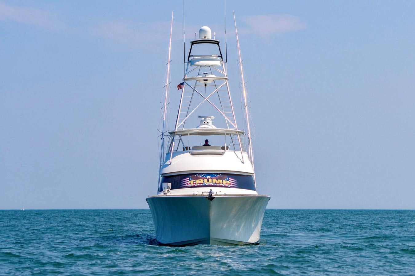 a white boat in the water aboard LIFE IS GOOD Yacht for Sale